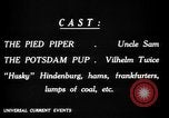 Image of Animated Uncle Sam as Pied Piper United States USA, 1918, second 24 stock footage video 65675042476