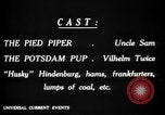 Image of Animated Uncle Sam as Pied Piper United States USA, 1918, second 26 stock footage video 65675042476
