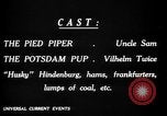 Image of Animated Uncle Sam as Pied Piper United States USA, 1918, second 28 stock footage video 65675042476