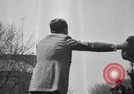 Image of Douglas Fairbanks and Mary Pickford selling WWI bonds Washington DC USA, 1918, second 5 stock footage video 65675042481