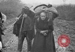 Image of French refugees with American soldiers in World War I France, 1918, second 28 stock footage video 65675042495