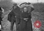 Image of French refugees with American soldiers in World War I France, 1918, second 29 stock footage video 65675042495