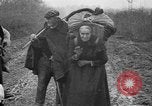 Image of French refugees with American soldiers in World War I France, 1918, second 31 stock footage video 65675042495