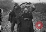 Image of French refugees with American soldiers in World War I France, 1918, second 32 stock footage video 65675042495