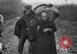 Image of French refugees with American soldiers in World War I France, 1918, second 35 stock footage video 65675042495