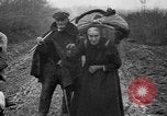 Image of French refugees with American soldiers in World War I France, 1918, second 36 stock footage video 65675042495