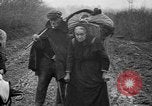 Image of French refugees with American soldiers in World War I France, 1918, second 37 stock footage video 65675042495