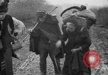 Image of French refugees with American soldiers in World War I France, 1918, second 39 stock footage video 65675042495