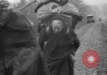 Image of French refugees with American soldiers in World War I France, 1918, second 44 stock footage video 65675042495