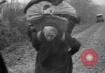 Image of French refugees with American soldiers in World War I France, 1918, second 45 stock footage video 65675042495