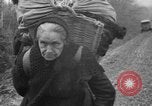 Image of French refugees with American soldiers in World War I France, 1918, second 46 stock footage video 65675042495