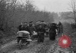 Image of French refugees with American soldiers in World War I France, 1918, second 50 stock footage video 65675042495