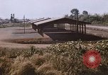 Standbild Holzhäuser Takhli Thailand, 1965, aus Sekunde 20 historischem Filmmaterial Videoclip 65675042559