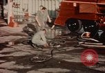 Image of American airmen in firehouse at airbase Takhli Thailand, 1964, second 3 stock footage video 65675042581