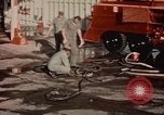 Image of American airmen in firehouse at airbase Takhli Thailand, 1964, second 4 stock footage video 65675042581