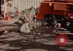 Image of American airmen in firehouse at airbase Takhli Thailand, 1964, second 5 stock footage video 65675042581