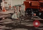 Image of American airmen in firehouse at airbase Takhli Thailand, 1964, second 6 stock footage video 65675042581