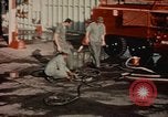 Image of American airmen in firehouse at airbase Takhli Thailand, 1964, second 7 stock footage video 65675042581