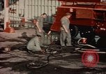 Image of American airmen in firehouse at airbase Takhli Thailand, 1964, second 8 stock footage video 65675042581