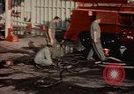 Image of American airmen in firehouse at airbase Takhli Thailand, 1964, second 9 stock footage video 65675042581