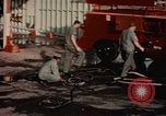 Image of American airmen in firehouse at airbase Takhli Thailand, 1964, second 10 stock footage video 65675042581