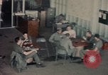 Image of American airmen in firehouse at airbase Takhli Thailand, 1964, second 14 stock footage video 65675042581