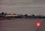 Image of American airmen in firehouse at airbase Takhli Thailand, 1964, second 24 stock footage video 65675042581