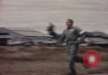 Image of American airmen in firehouse at airbase Takhli Thailand, 1964, second 32 stock footage video 65675042581