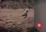 Image of American airmen in firehouse at airbase Takhli Thailand, 1964, second 59 stock footage video 65675042581