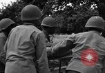 Image Bataillon d'artillerie de la 92e Division d'infanterie (en couleur) Mantes de Gassicourt France, 1944, de la seconde 15 séquences d'archives historiques vidéo 65675042599