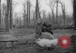 Standbild Deutsche Schneiden von Bäumen für Kraftstoff in Berlin nach Zweiten Weltkrieg Berlin Deutschland, 1945, aus Sekunde 31 historischem Filmmaterial Videoclip 65675042630