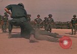 Image of hand to hand combat Vietnam, 1970, second 22 stock footage video 65675042677