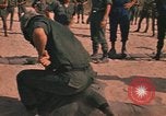 Image of hand to hand combat Vietnam, 1970, second 54 stock footage video 65675042677