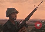 Image of M-16 rifle Vietnam, 1970, second 1 stock footage video 65675042678