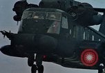 Image of HH-53 helicopter rescue operation Vietnam, 1970, second 12 stock footage video 65675042713