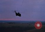 Image of HH-53 helicopter rescue operation Vietnam, 1970, second 52 stock footage video 65675042713