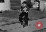 Image of unicycle Los Angeles California USA, 1933, second 17 stock footage video 65675042743