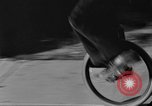 Image of unicycle Los Angeles California USA, 1933, second 18 stock footage video 65675042743