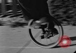 Image of unicycle Los Angeles California USA, 1933, second 19 stock footage video 65675042743