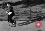 Image of unicycle Los Angeles California USA, 1933, second 23 stock footage video 65675042743