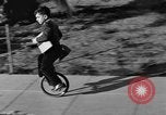 Image of unicycle Los Angeles California USA, 1933, second 24 stock footage video 65675042743