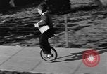 Image of unicycle Los Angeles California USA, 1933, second 25 stock footage video 65675042743