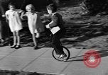 Image of unicycle Los Angeles California USA, 1933, second 26 stock footage video 65675042743