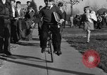 Image of unicycle Los Angeles California USA, 1933, second 32 stock footage video 65675042743