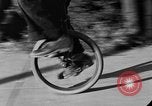 Image of unicycle Los Angeles California USA, 1933, second 46 stock footage video 65675042743