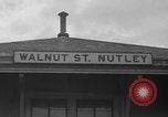 Image of suburban train Nutley New Jersey USA, 1936, second 14 stock footage video 65675042782