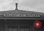 Image of suburban train Nutley New Jersey USA, 1936, second 18 stock footage video 65675042782