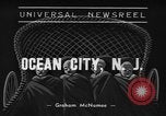 Image of children's parade on the boardwalk Ocean City New Jersey USA, 1939, second 1 stock footage video 65675042797
