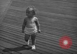 Image of children's parade on the boardwalk Ocean City New Jersey USA, 1939, second 20 stock footage video 65675042797