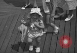 Image of children's parade on the boardwalk Ocean City New Jersey USA, 1939, second 30 stock footage video 65675042797